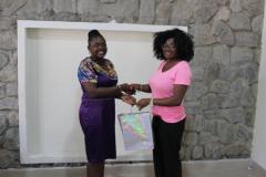 PRESENTATION OF GIFT TO NONSO THE VISITING STUDENT